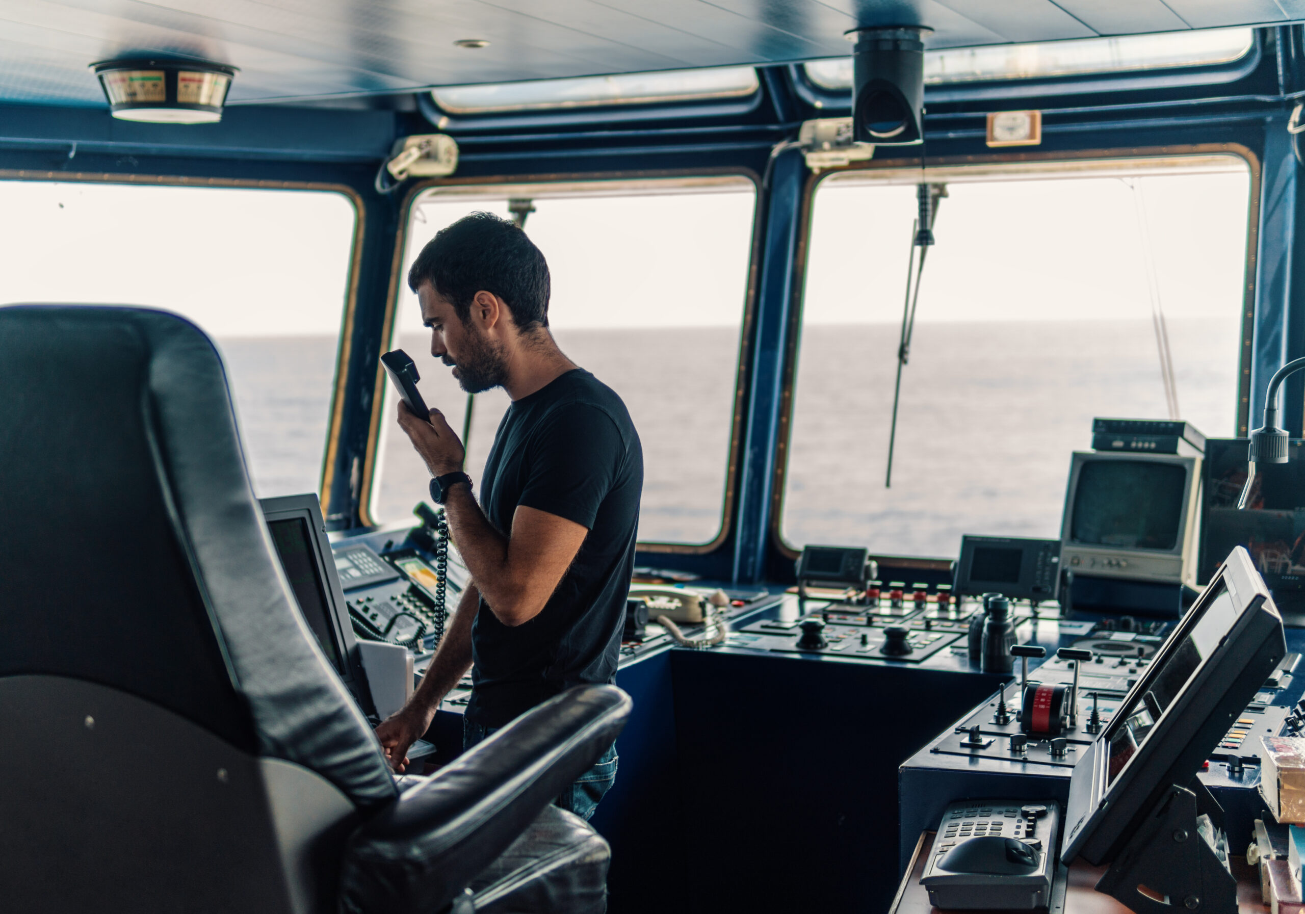 Marine navigational officer is reporting by VHF radio