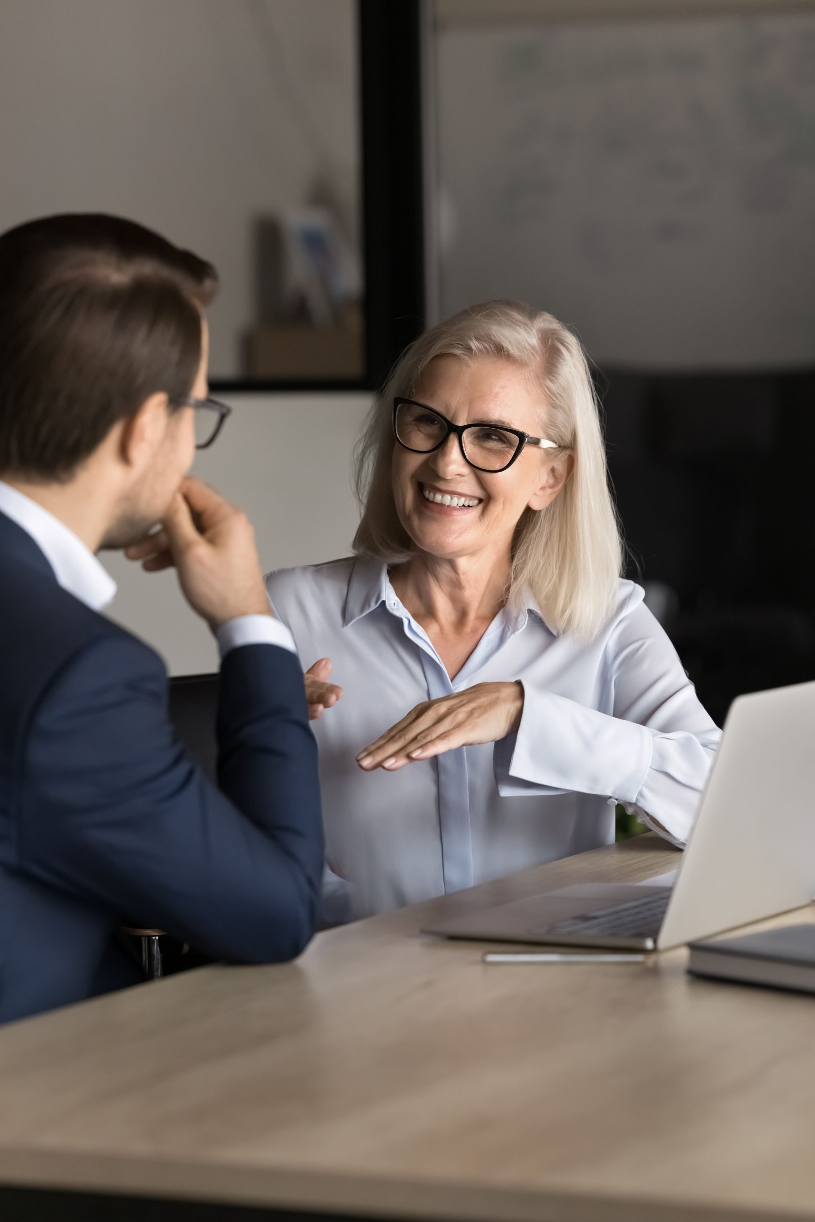 Insurance advisor discussing with business owner