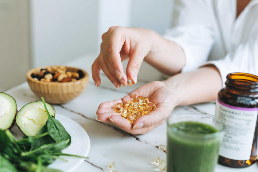 doctor nutritionist with omega 3, vit